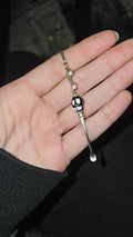 Skull and pearls tool