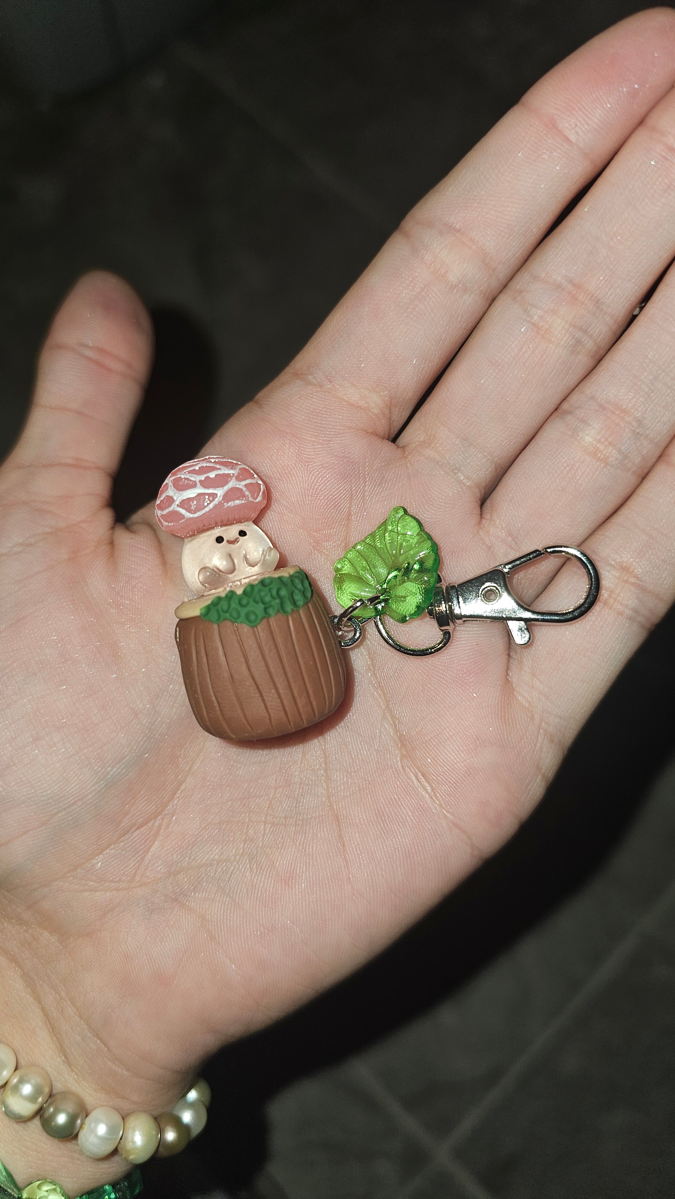 Glow in the dark mushies on a stump keychains