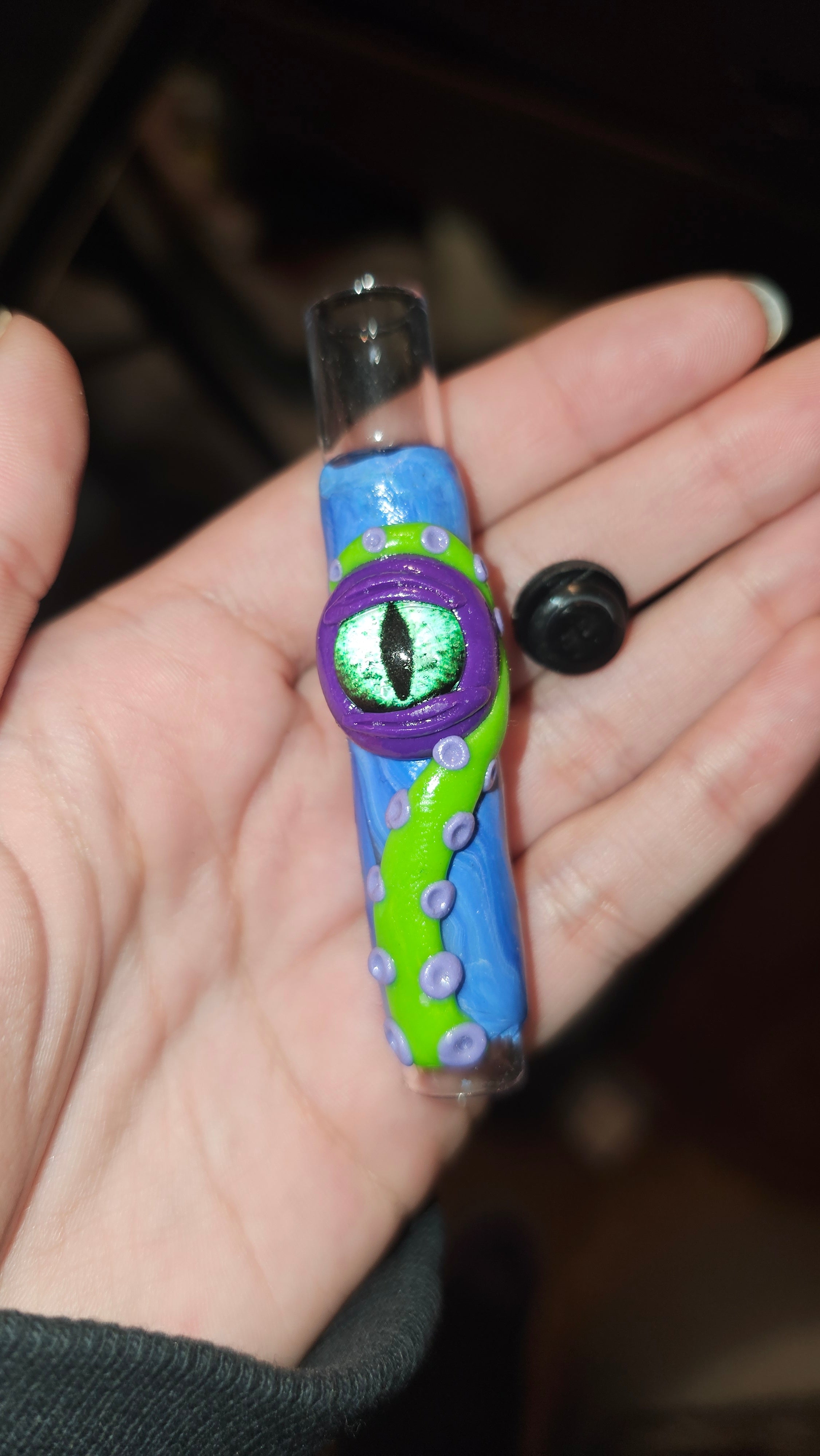 Purple green eye tentacle piece